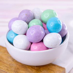 pastel candies in a white bowl
